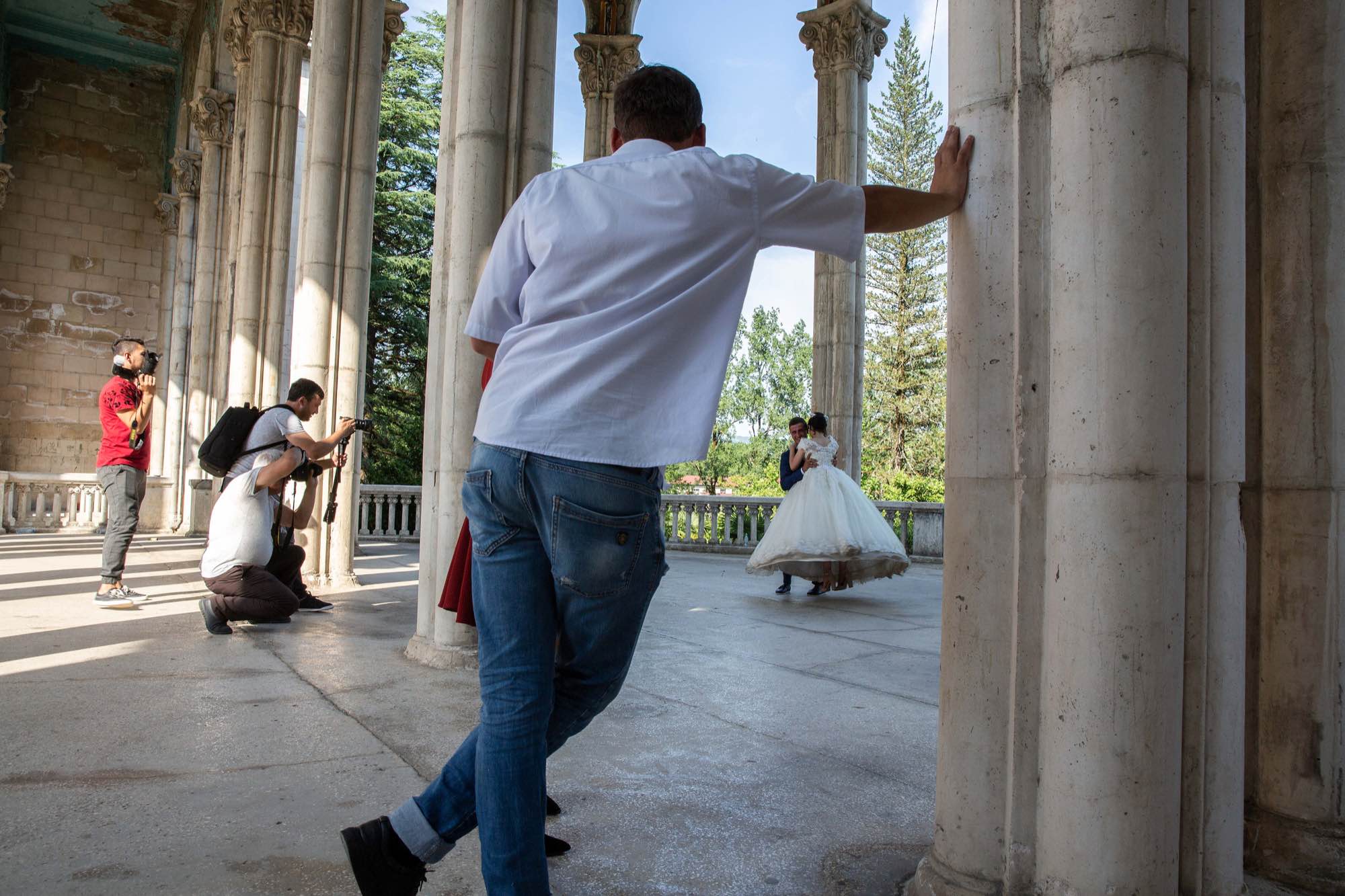 Residents from nearby towns have their wedding photos taken at the ruins of Sanatorium Medea in Tskatulbo, Georgia on June 15, 2019.