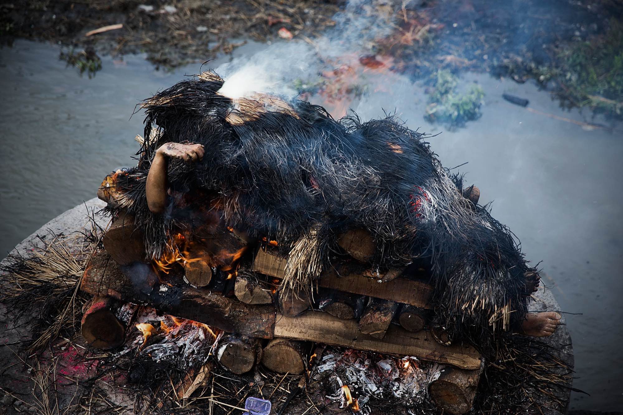 A body is cremated at Pashupatinath Temple in Kathmandu, Nepal on April 29, 2015.